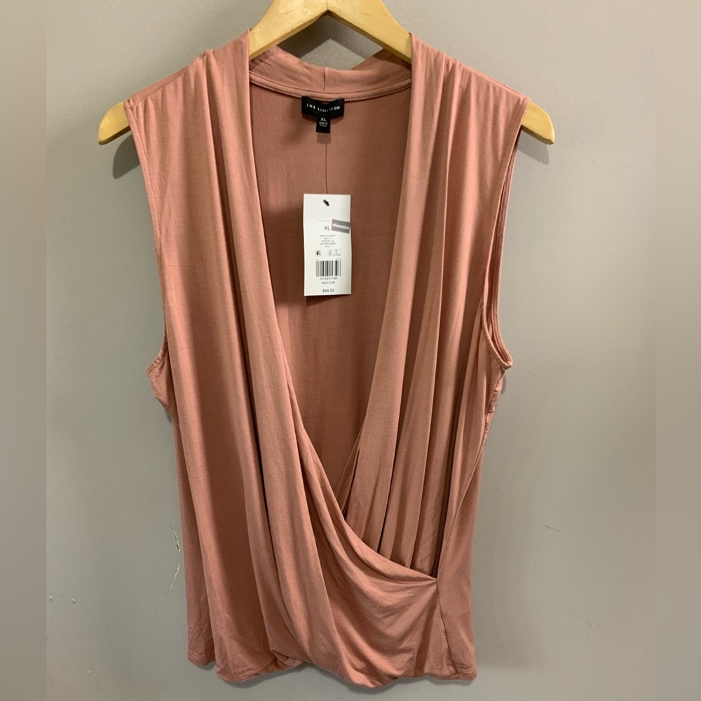 The limited Pink Draped Sleeveless Top